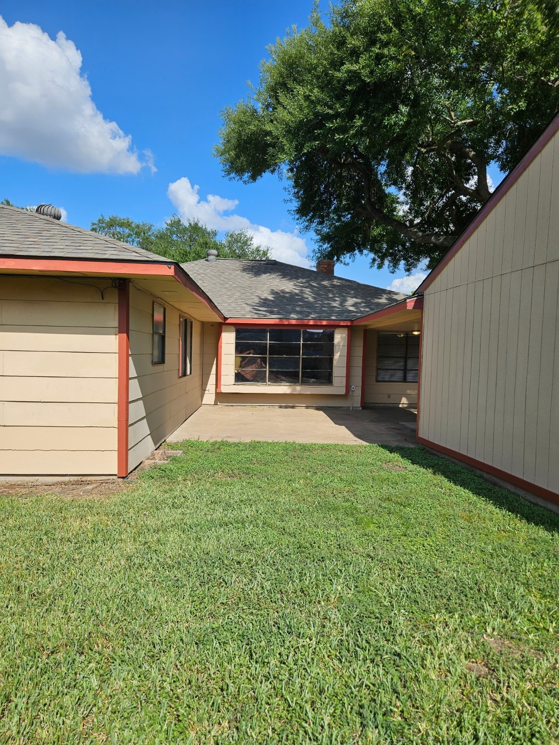 7206 Navidad Road Houston, TX 77083 - Photo 18 of 48 a view of a house with a backyard