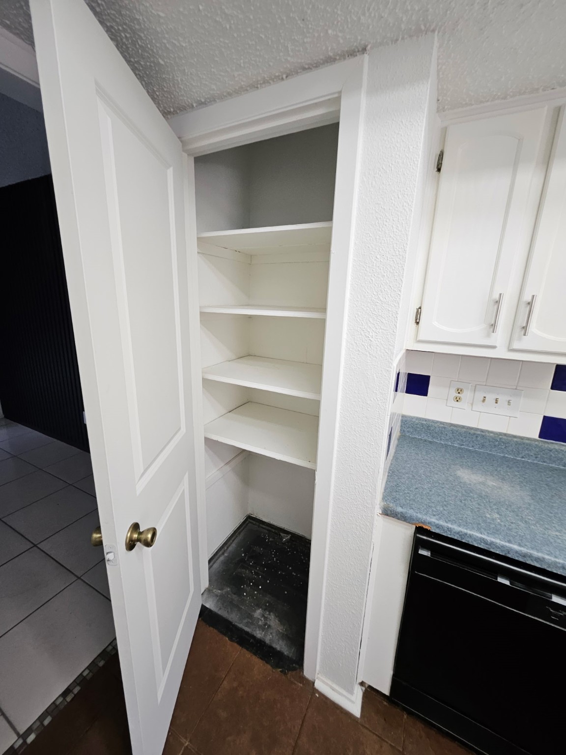 7206 Navidad Road Houston, TX 77083 - Photo 22 of 48 a view of washer and dryer in a kitchen