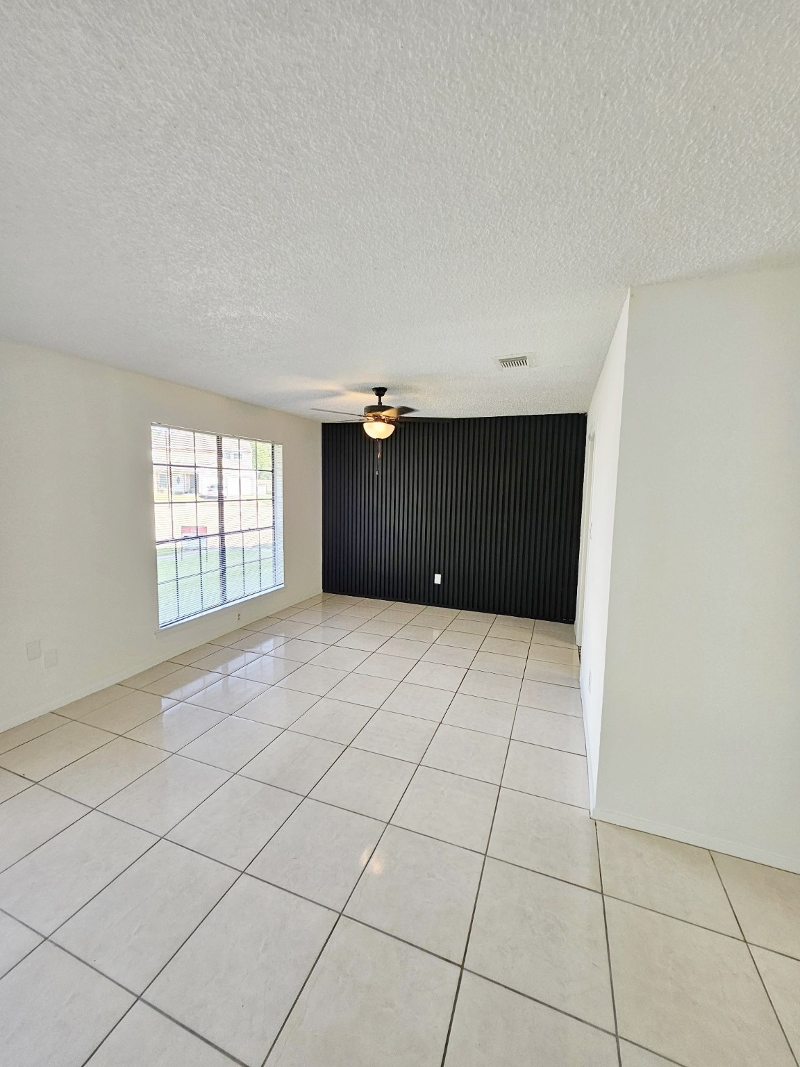 7206 Navidad Road Houston, TX 77083 - Photo 27 of 48 a view of an empty room and window