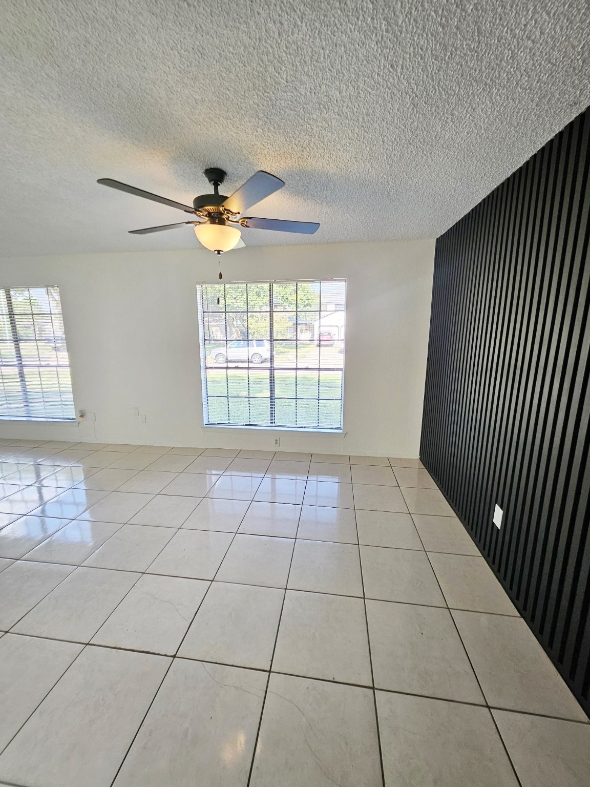 7206 Navidad Road Houston, TX 77083 - Photo 28 of 48 a view of an empty room with a window