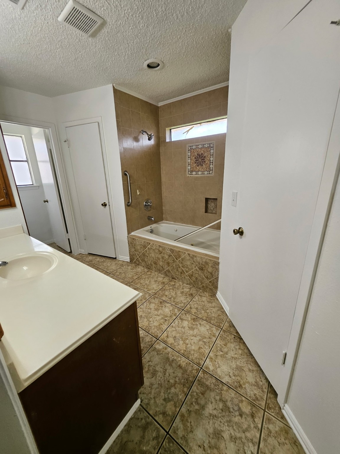 7206 Navidad Road Houston, TX 77083 - Photo 41 of 48 a bathroom with a sink and a mirror