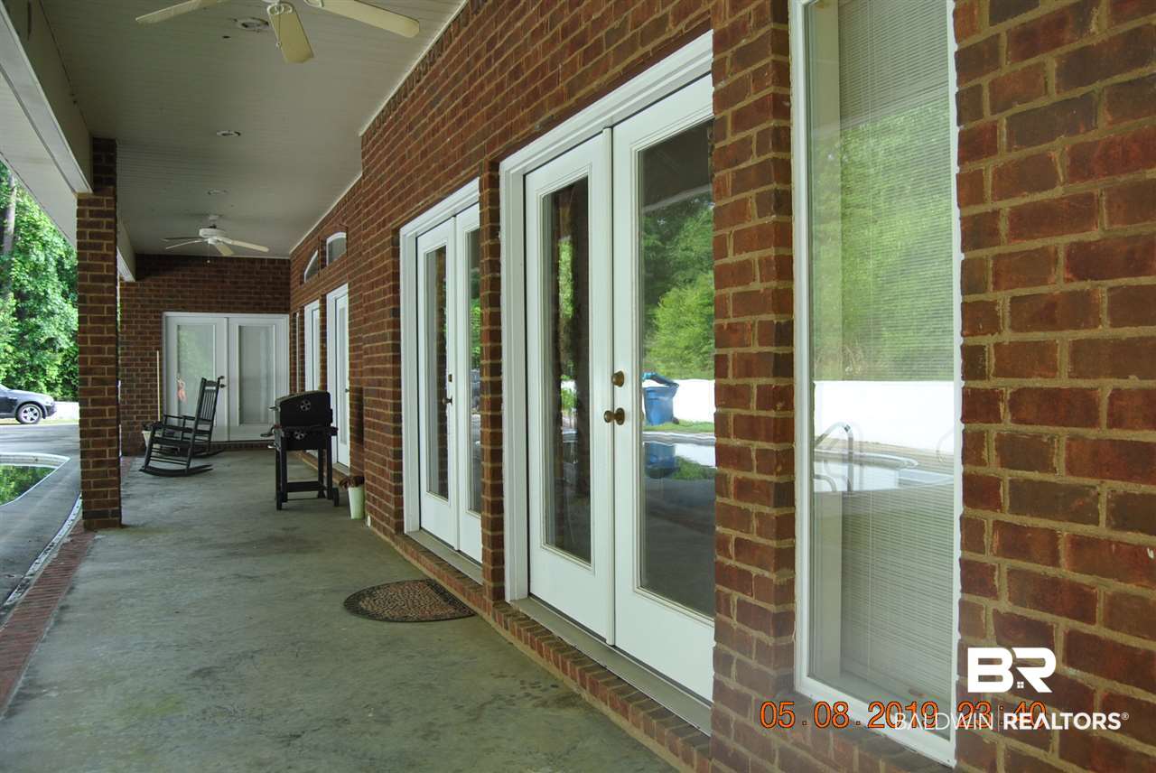 411 Juniper Creek Road Brewton, AL 36426 - Photo 35 of 35 shows length of covered patio
