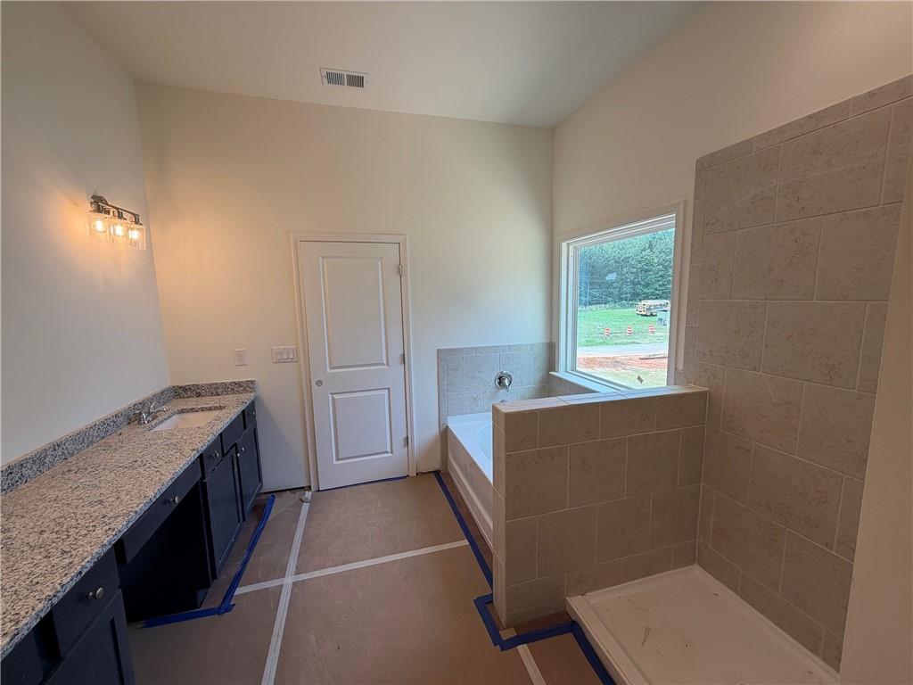 41 Woodland Road Covington, GA 30016 - Photo 9 of 46 a room with furniture and window