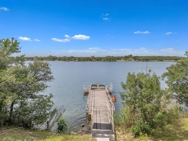 a view of a lake with a mountain in the background