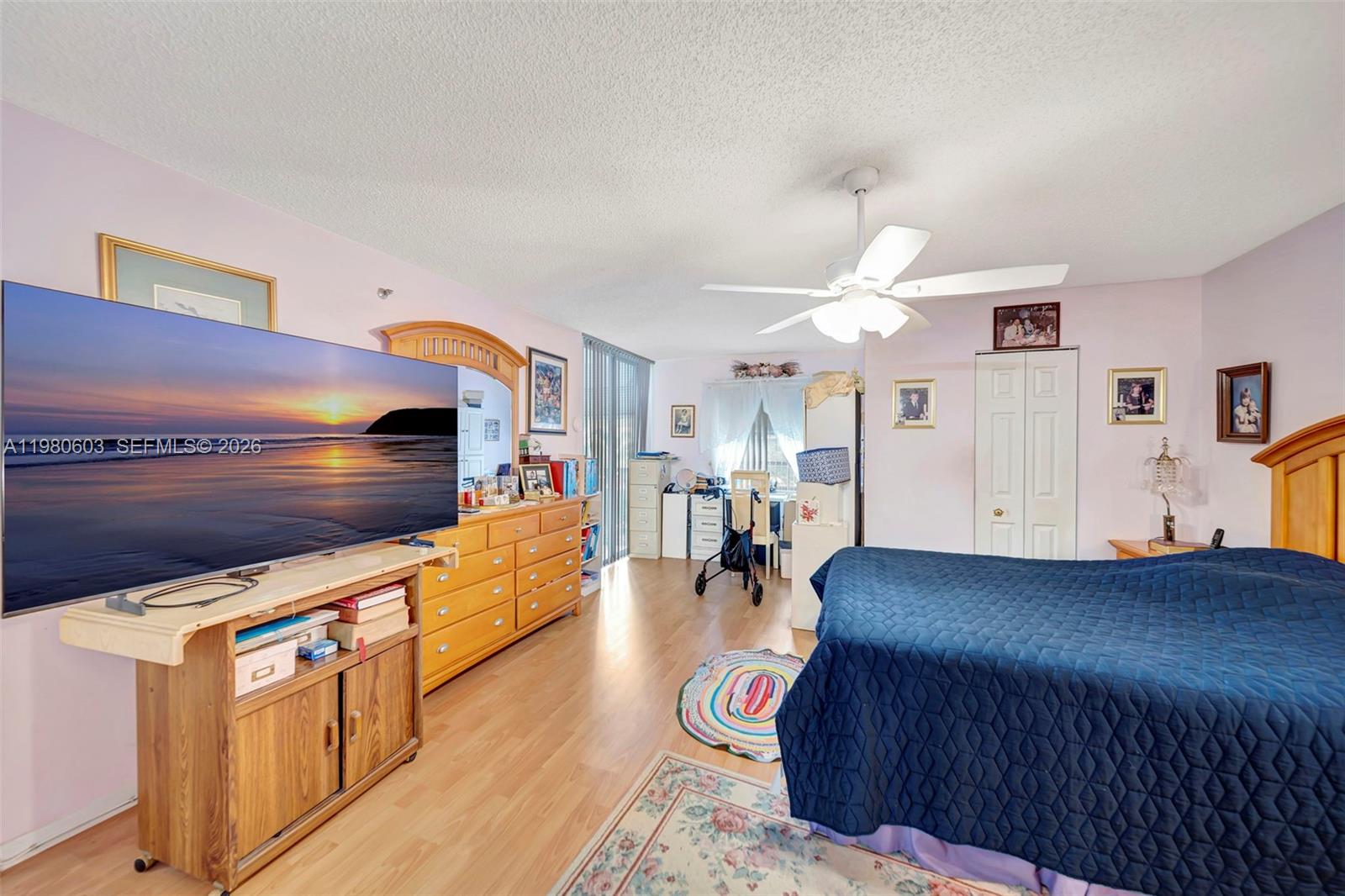3940 Inverrary Boulevard, Unit 303A Lauderhill, FL 33319 - Photo 12 of 28 a living room with stainless steel appliances kitchen island granite countertop furniture and a kitchen view