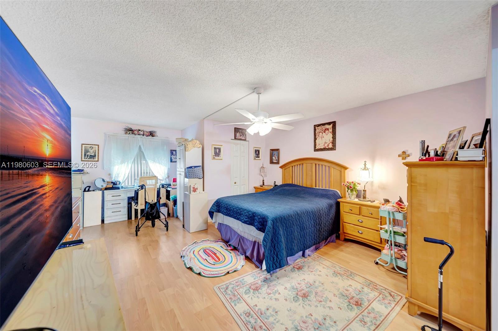 3940 Inverrary Boulevard, Unit 303A Lauderhill, FL 33319 - Photo 13 of 28 a living room with furniture and a couch
