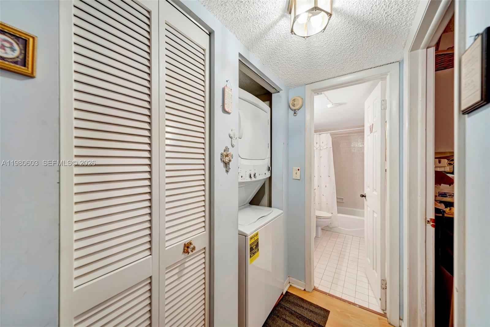 3940 Inverrary Boulevard, Unit 303A Lauderhill, FL 33319 - Photo 17 of 28 a view of a hallway with closet and entryway