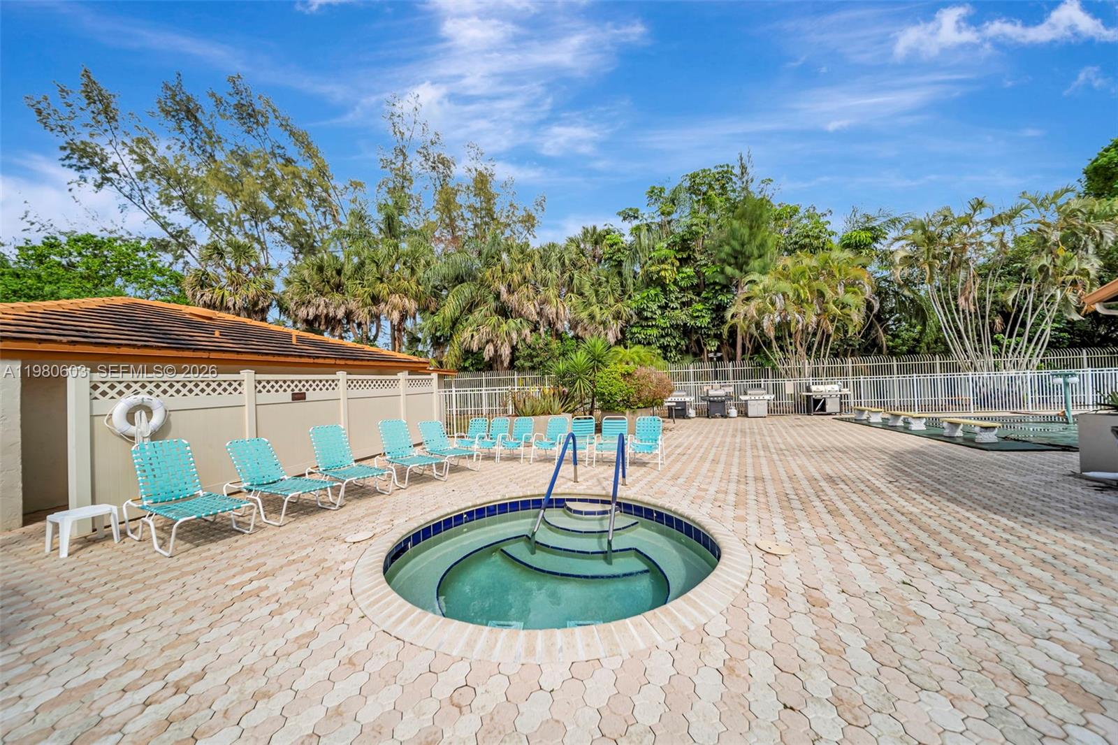 3940 Inverrary Boulevard, Unit 303A Lauderhill, FL 33319 - Photo 21 of 28 a house with trees in front of it