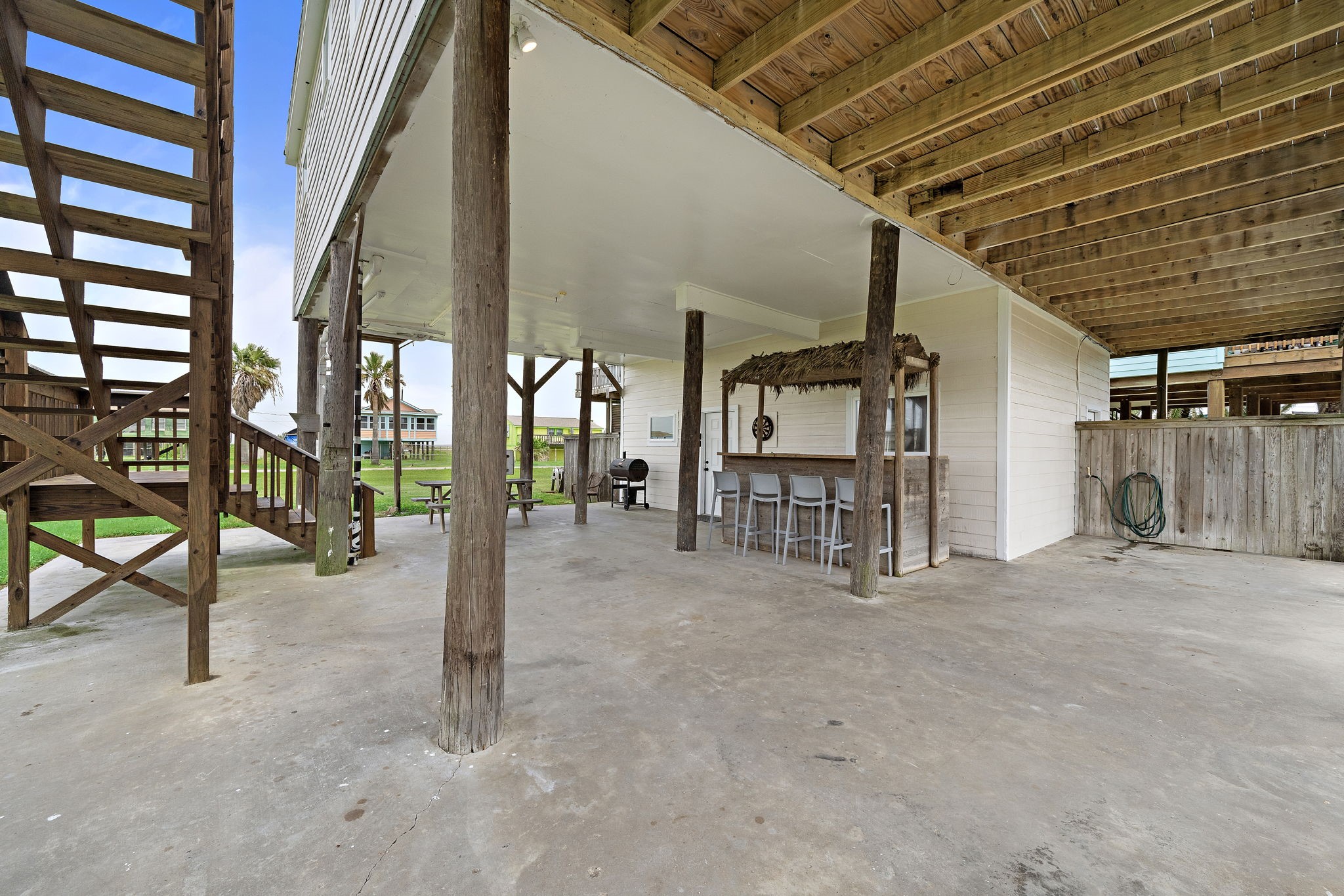 417 Olive Street Surfside Beach, TX 77541 - Photo 39 of 46 a view of an empty room with windows