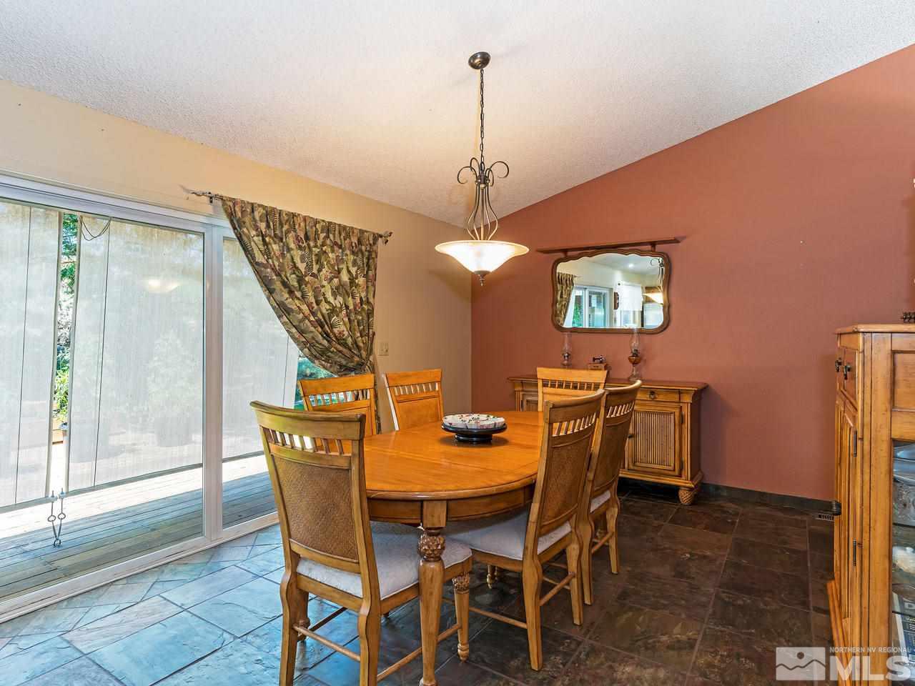 13055 Thomas Creek Road Reno, NV 89511 - Photo 6 of 24 a dining room with furniture and window