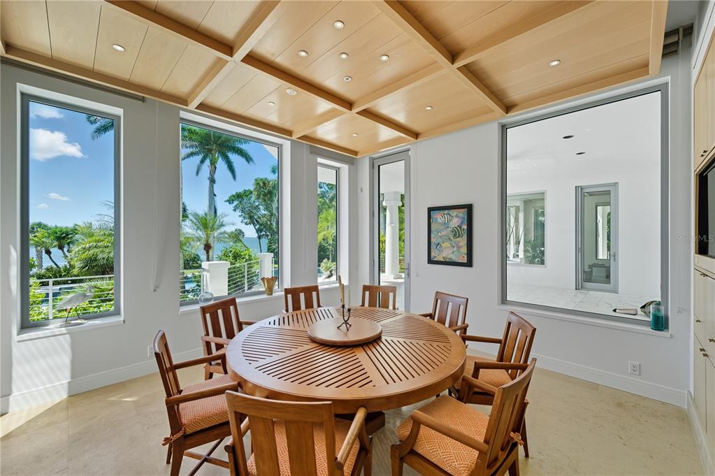 3315 Bay Shore Road Sarasota, FL 34234 - Photo 13 of 96 a view of a dining room with furniture window and outside view