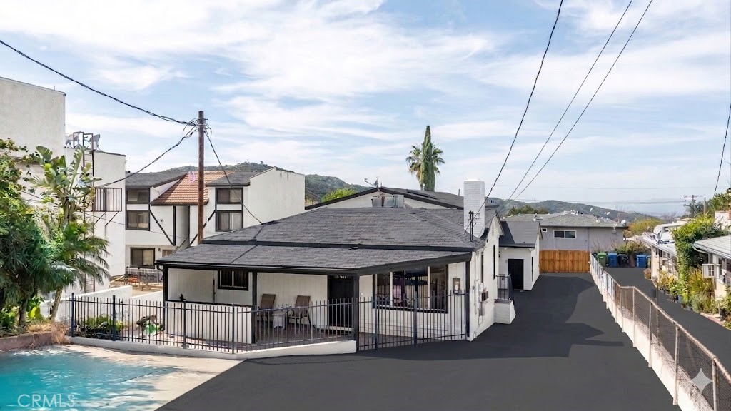 10139 Hillhaven Avenue Tujunga, CA 91042 - Photo 3 of 13 Digitally Enhanced with color paint and asphalt