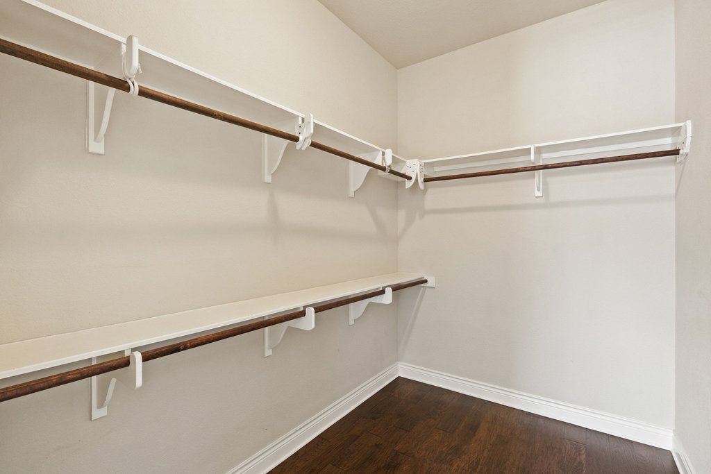 404 Amiata Avenue, Unit 34 Austin, TX 78734 - Photo 19 of 26 a view of a room with racks on the wall