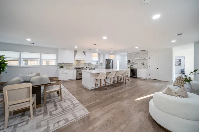 a living room with furniture and a table