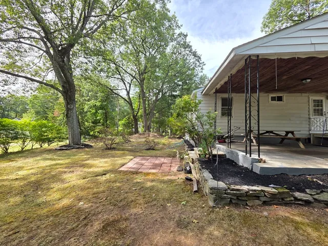 a view of backyard of house