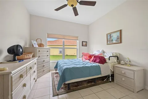 a bedroom with a bed and a cabinets