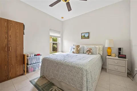 a bedroom with a bed and dresser