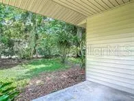 a view of a back yard of the house