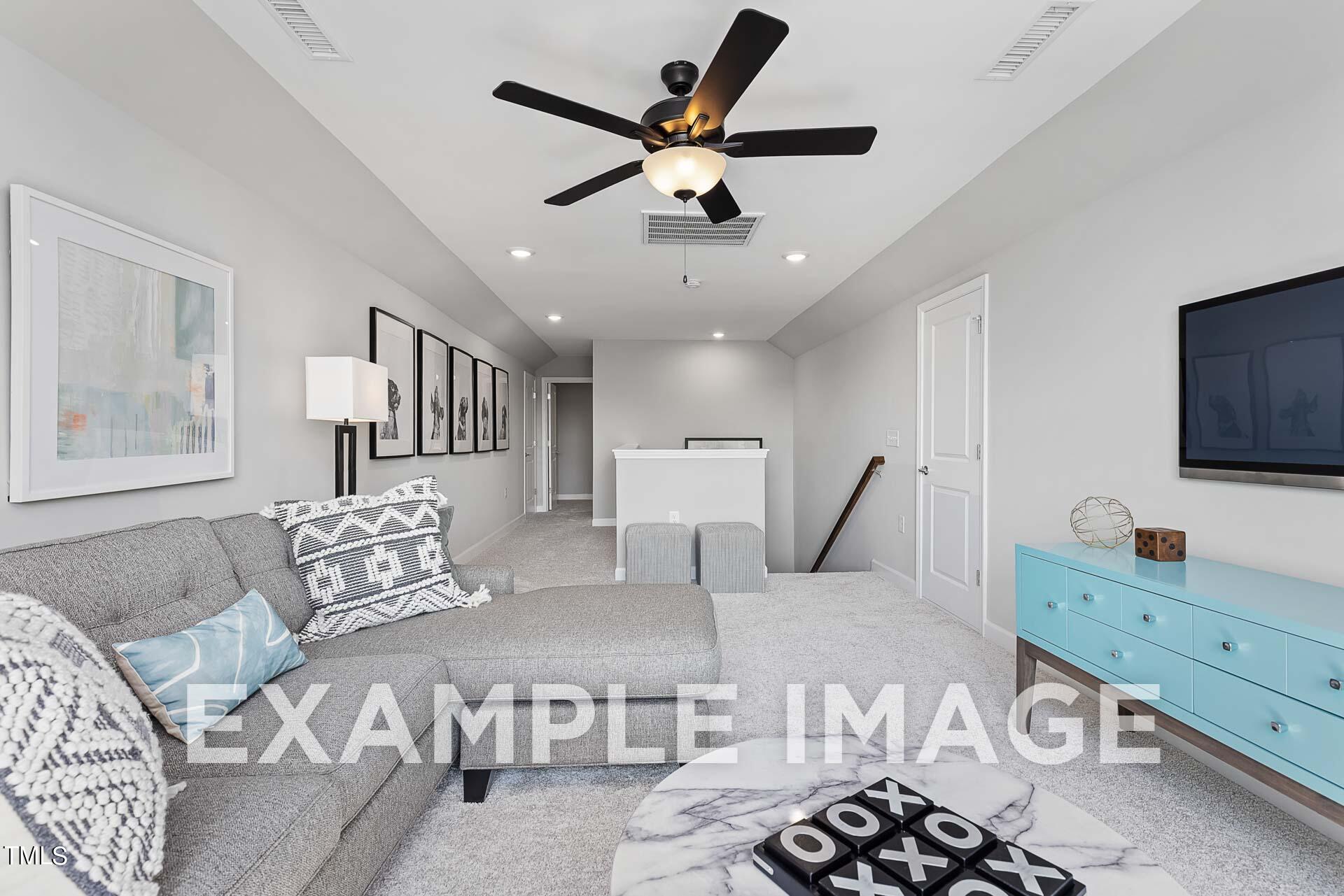 123 Golden Leaf Farms Road Angier, NC 27501 - Photo 28 of 32 Sample image, not actual home. 3rd floor media room