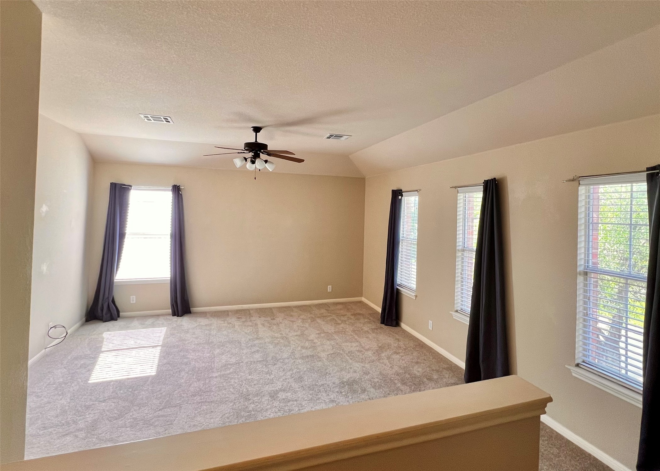 16616 Bridgefarmer Boulevard Pflugerville, TX 78660 - Photo 15 of 36 wooden floor in an empty room with a window