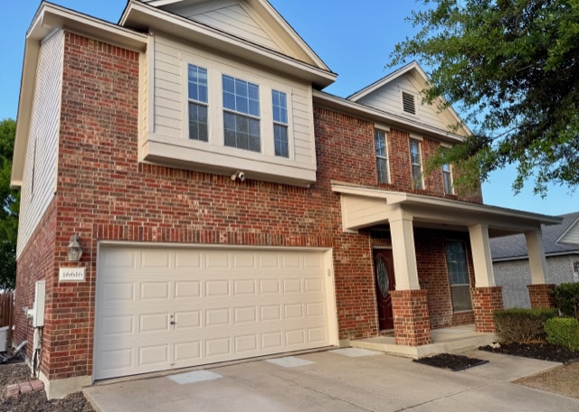 16616 Bridgefarmer Boulevard Pflugerville, TX 78660 - Photo 2 of 36 front view of a house