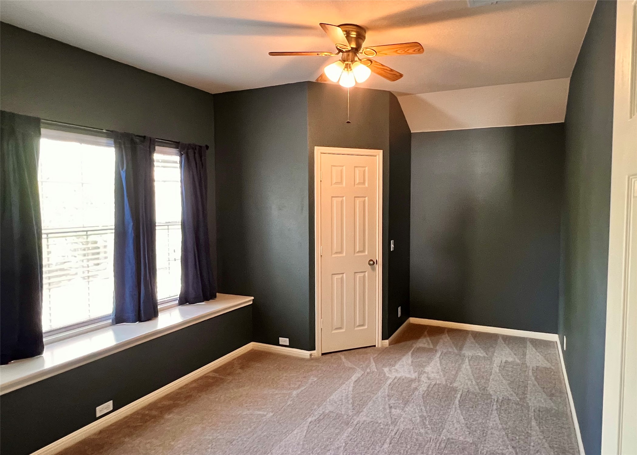 16616 Bridgefarmer Boulevard Pflugerville, TX 78660 - Photo 22 of 36 an empty room with windows and fan