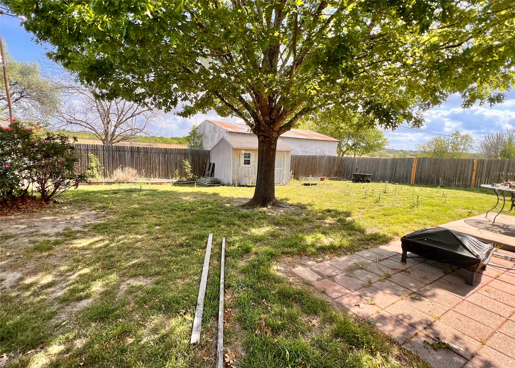 16616 Bridgefarmer Boulevard Pflugerville, TX 78660 - Photo 27 of 36 a view of backyard with swimming pool and seating space