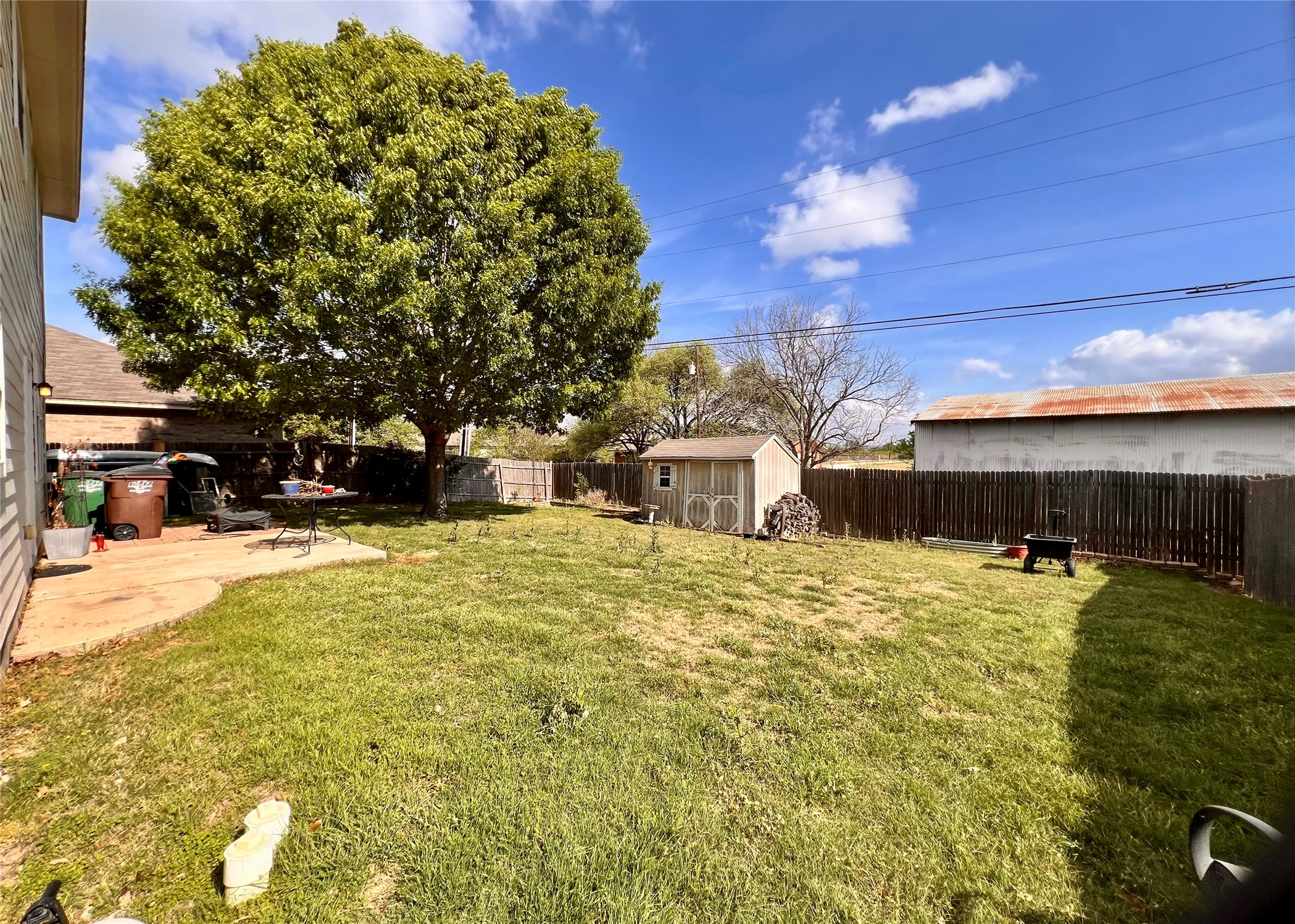 16616 Bridgefarmer Boulevard Pflugerville, TX 78660 - Photo 30 of 36 a view of a house with a yard