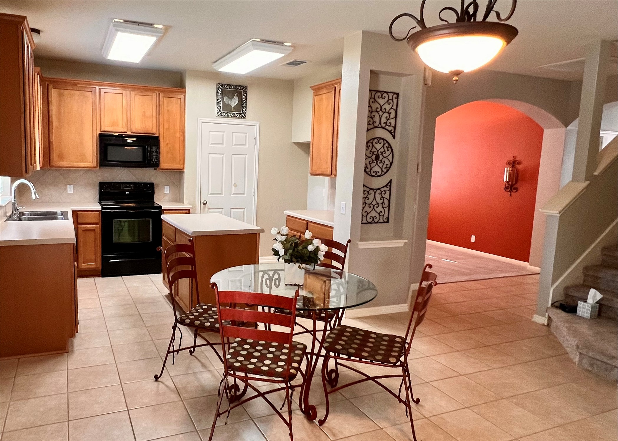 16616 Bridgefarmer Boulevard Pflugerville, TX 78660 - Photo 5 of 36 a view of a dining room with furniture