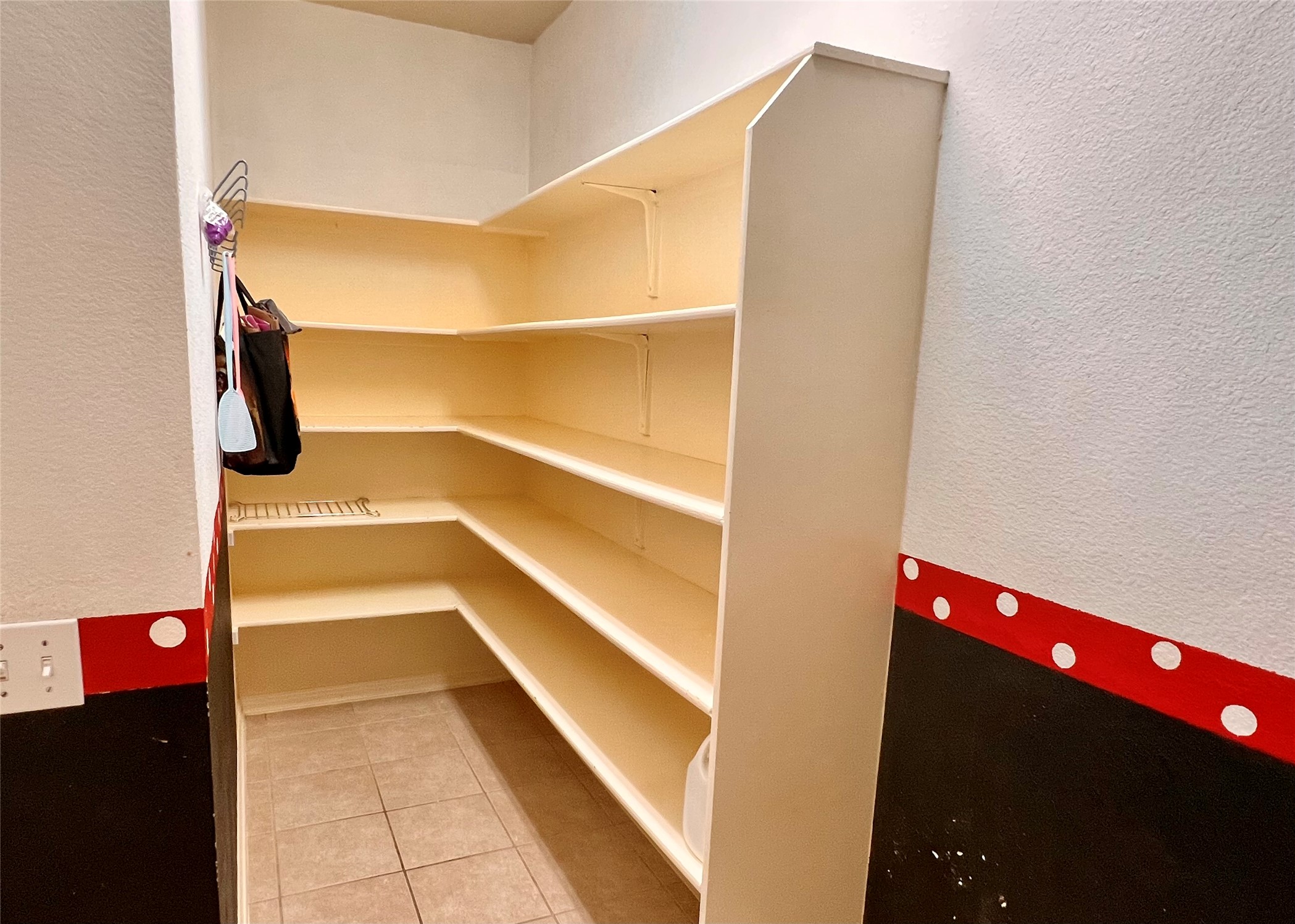 16616 Bridgefarmer Boulevard Pflugerville, TX 78660 - Photo 7 of 36 a view of walk in closet with clothes and shoes
