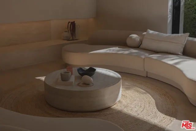 a workspace with furniture and window