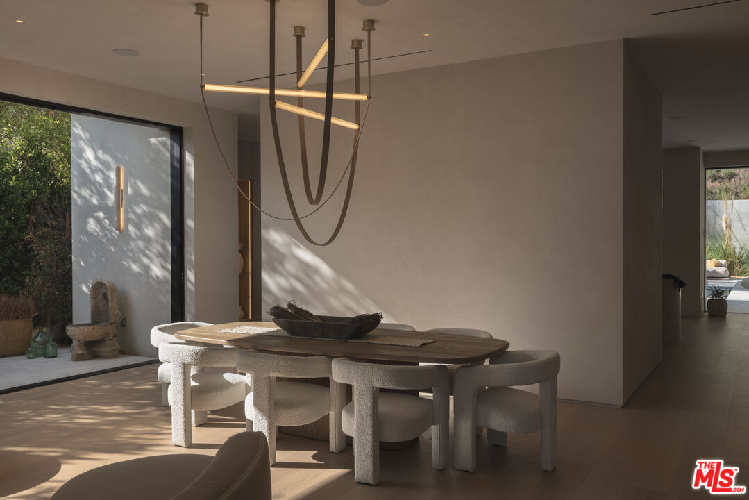 17177 Adlon Road Encino, CA 91436 - Photo 4 of 20 a workspace with furniture and window