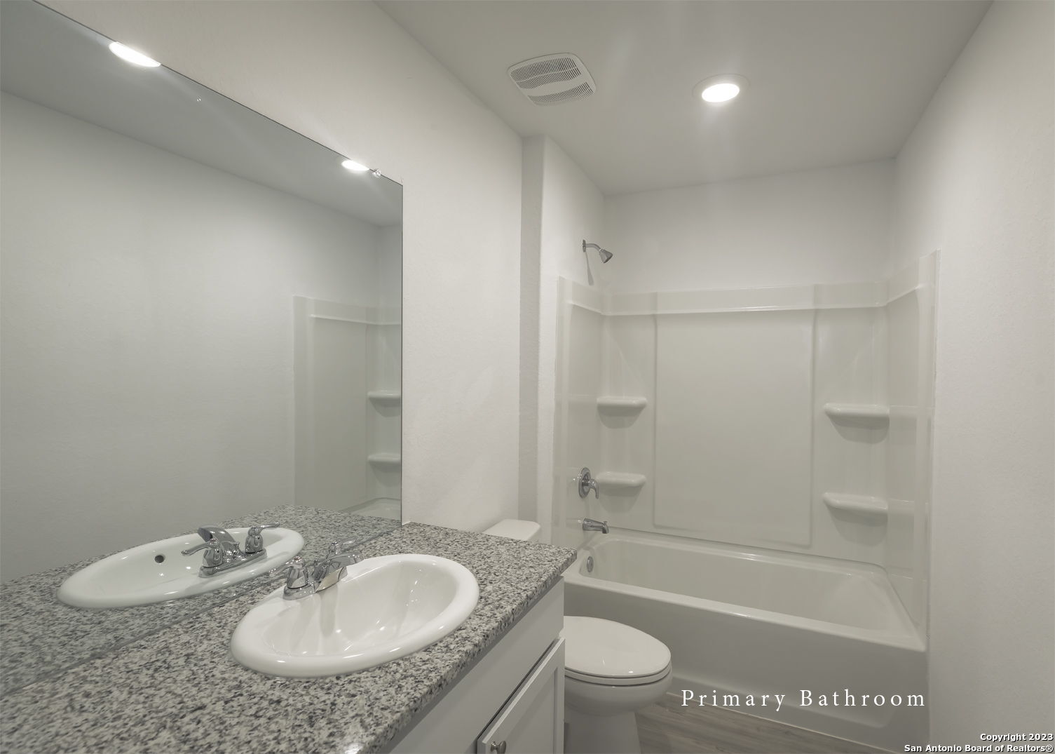 5909 San Geronimo Seguin, TX 78155 - Photo 11 of 16 a bathroom with a granite countertop sink toilet and shower
