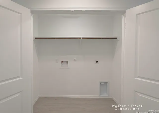 a view of small space with racks on the wall