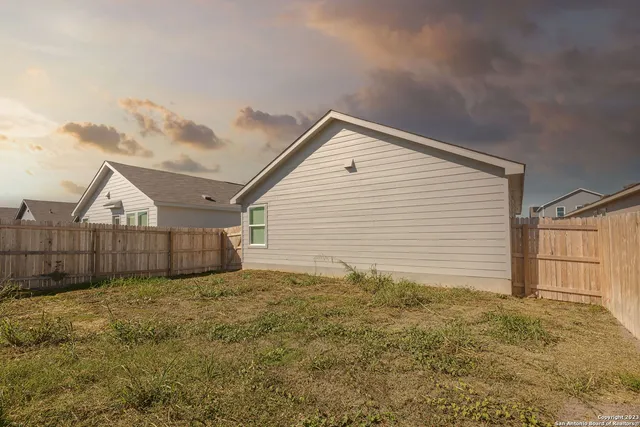 a view of backyard of house