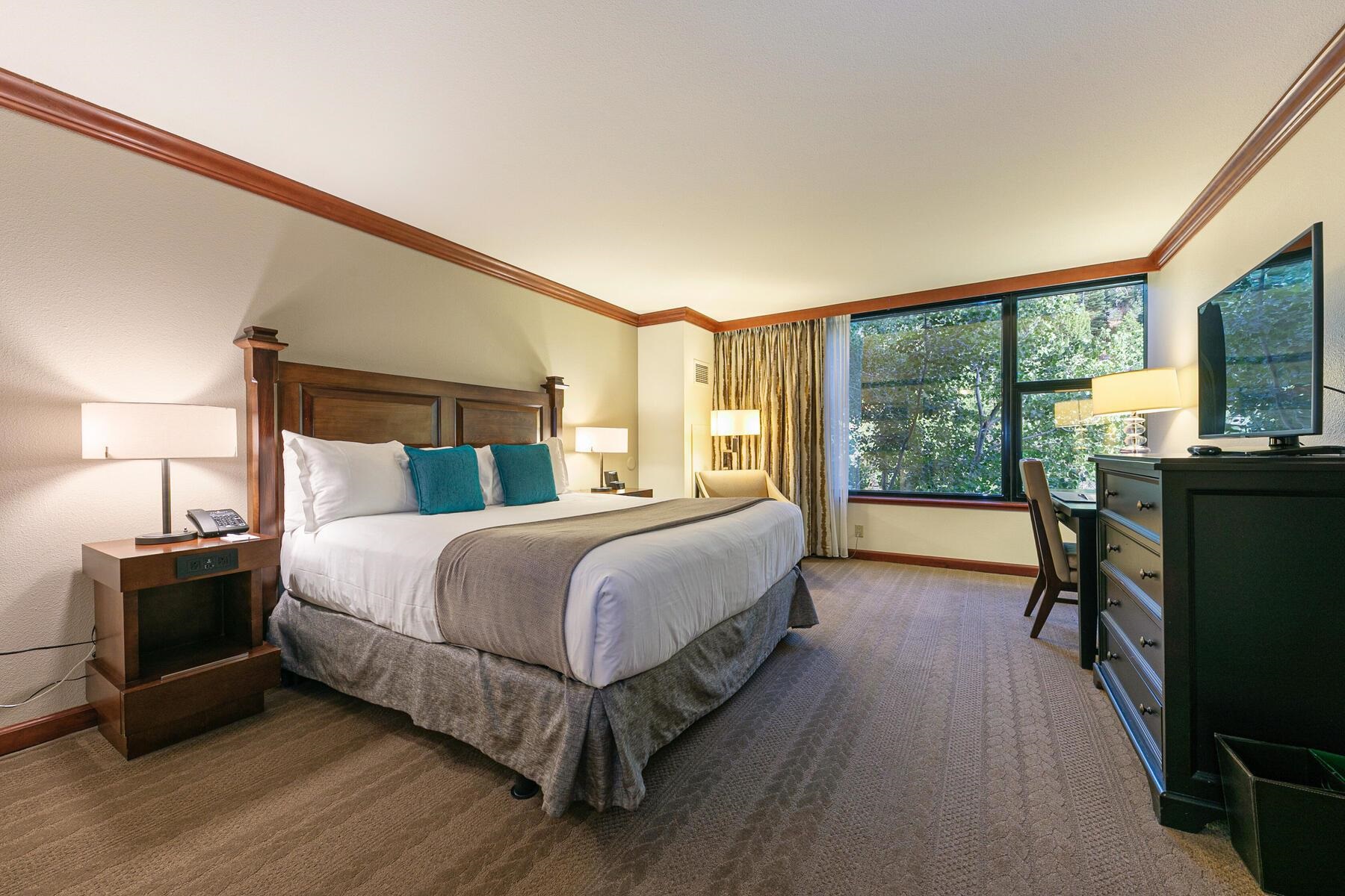 400 Resort Road, Unit 445/447 Olympic Valley, CA 96146 - Photo 18 of 27 a bedroom with a bed and a large window