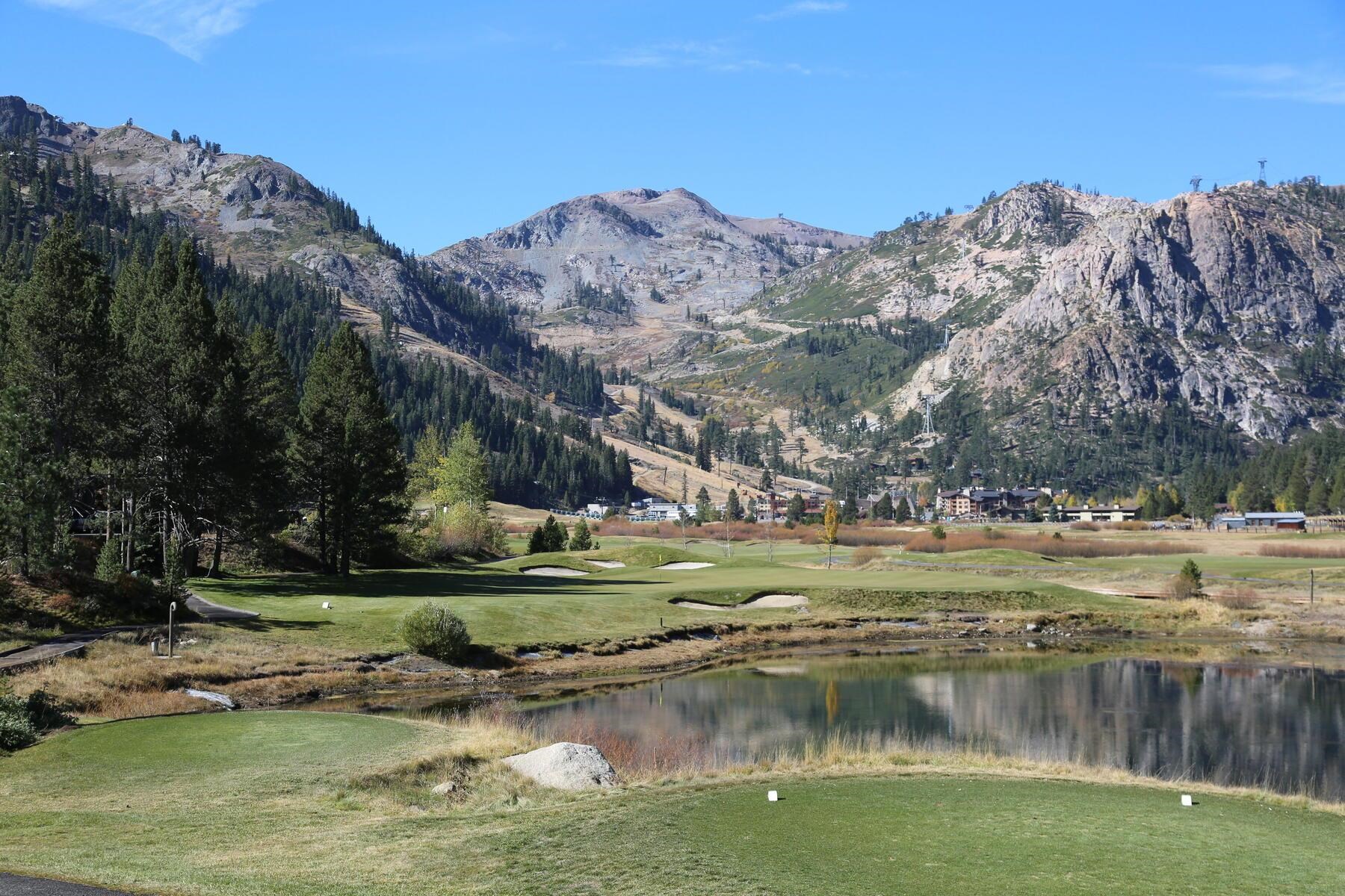 400 Resort Road, Unit 445/447 Olympic Valley, CA 96146 - Photo 4 of 27 a view of a lake with a mountain in the background