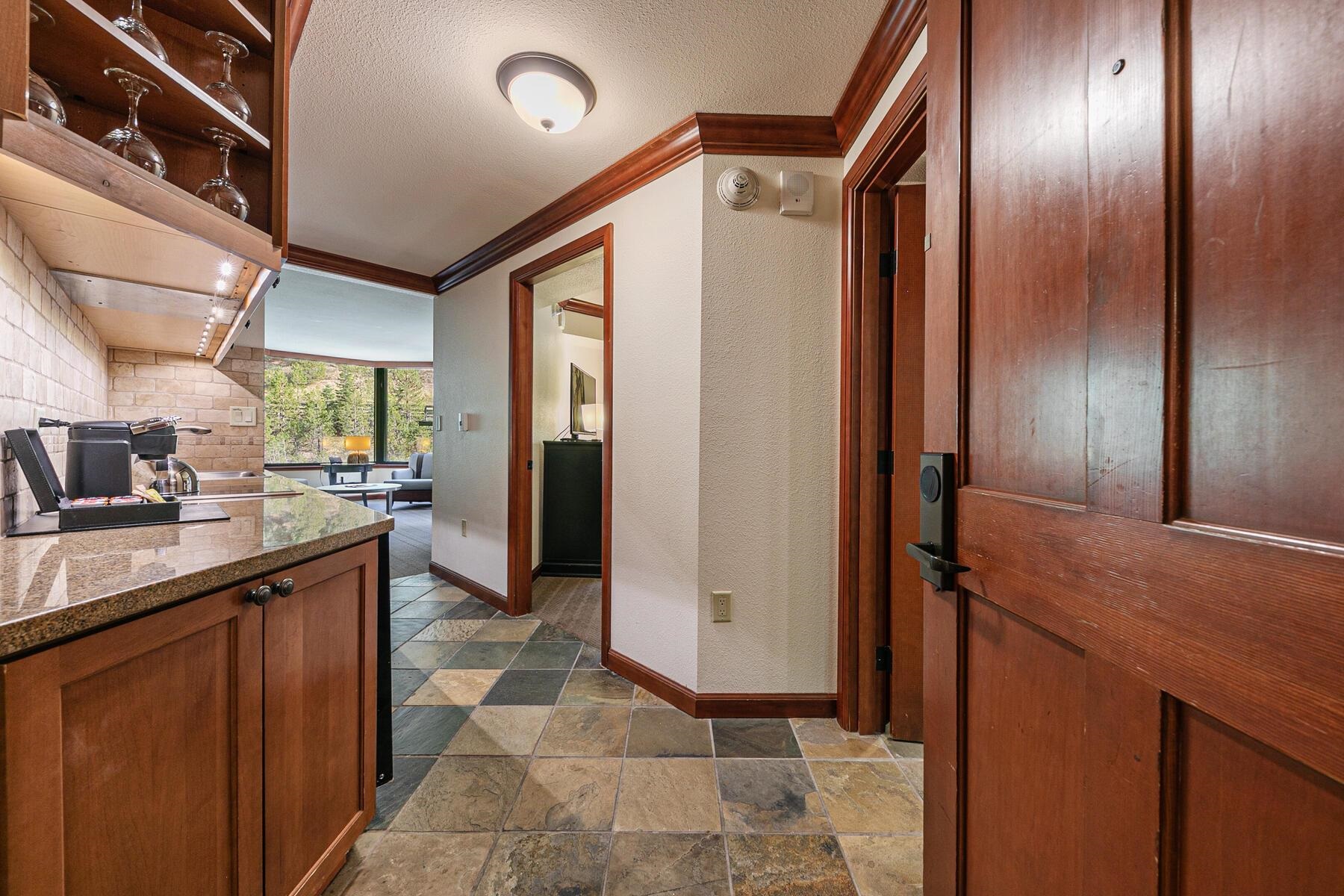 400 Resort Road, Unit 445/447 Olympic Valley, CA 96146 - Photo 5 of 27 a kitchen with stainless steel appliances granite countertop a refrigerator and a sink