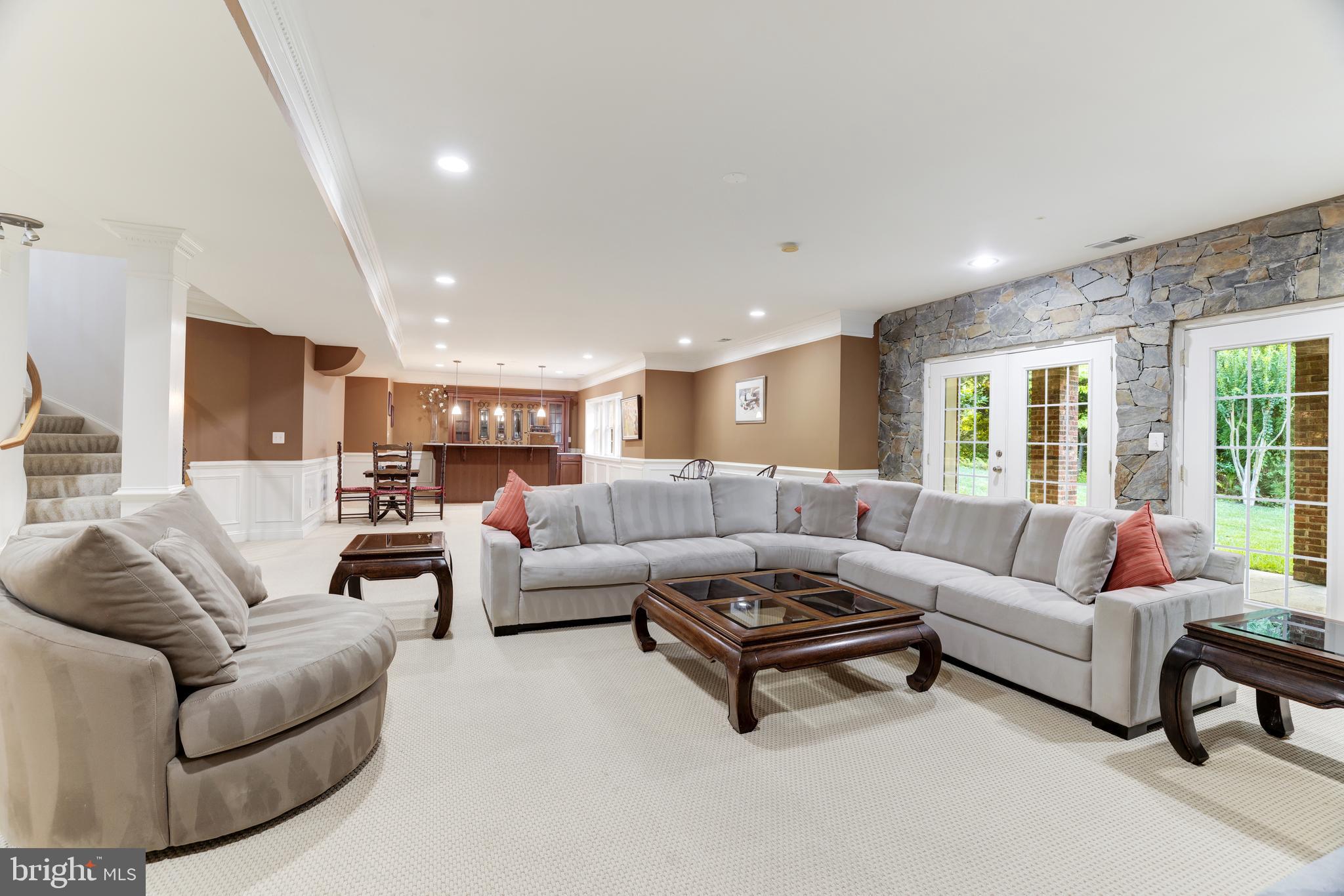 6318 Georgetown Pike McLean, VA 22101 - Photo 19 of 47 a living room with furniture and a large window