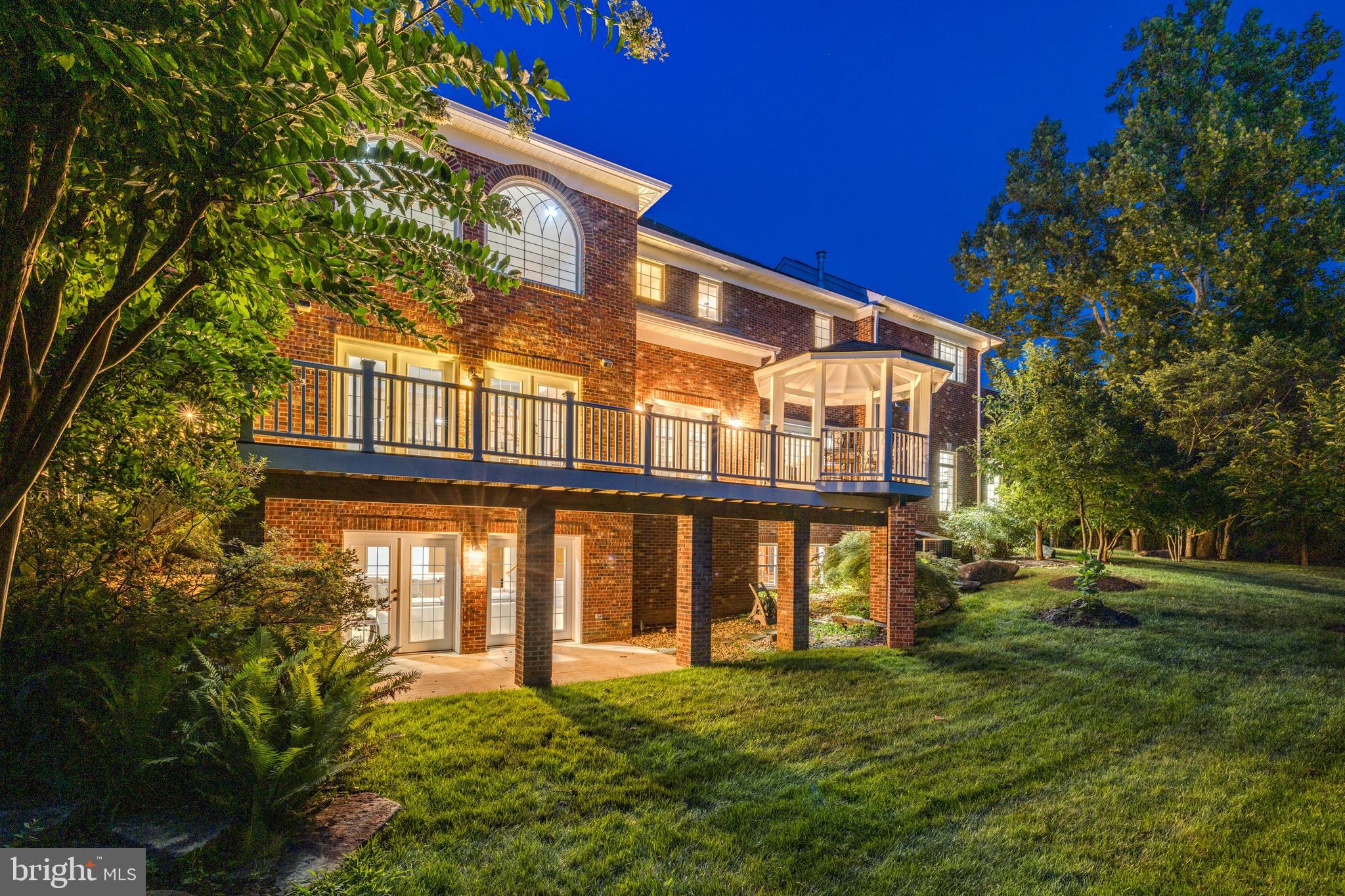 6318 Georgetown Pike McLean, VA 22101 - Photo 43 of 47 a large building with a big yard