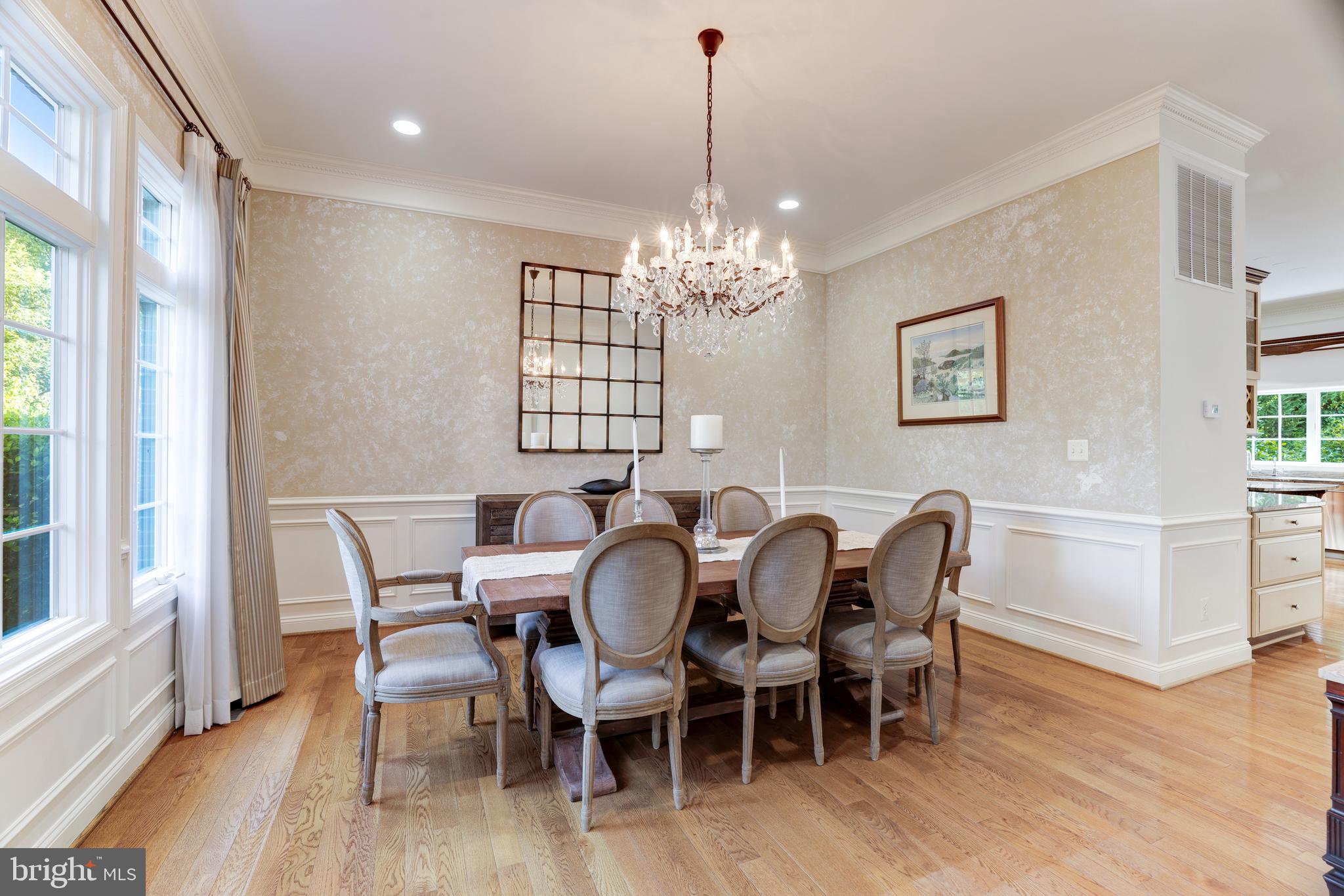 6318 Georgetown Pike McLean, VA 22101 - Photo 10 of 47 a view of a dining room with furniture wooden floor and chandelier