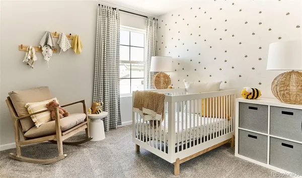 a bed room with a bed mirror and a window