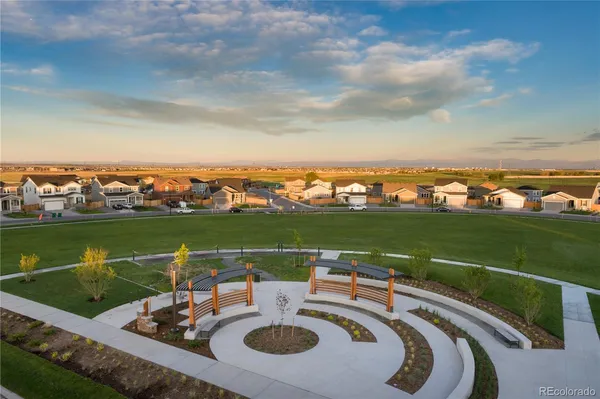 an aerial view of a house with a ocean view