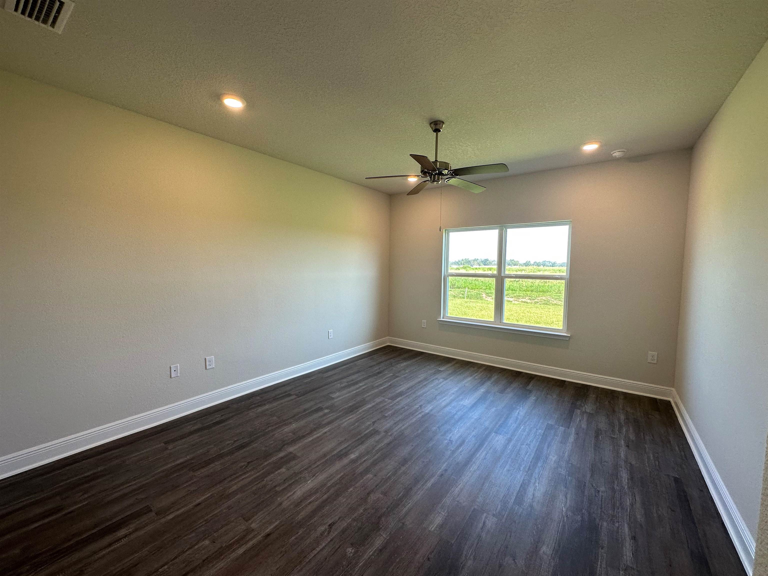 1005 Hayward Loop, Unit 13 Foley, AL 36535 - Photo 12 of 18 Primary Bedroom