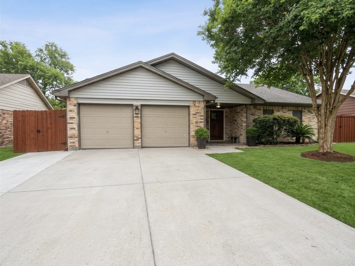 beautiful curb appeal. Lots of extra parking space with meticulously maintained front yard.