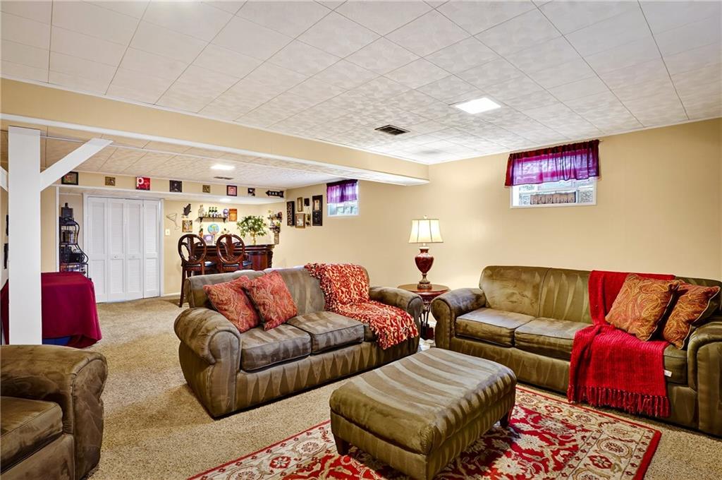 104 Thorncrest Drive McKees Rocks, PA 15136 - Photo 23 of 34 a living room with furniture and a couch