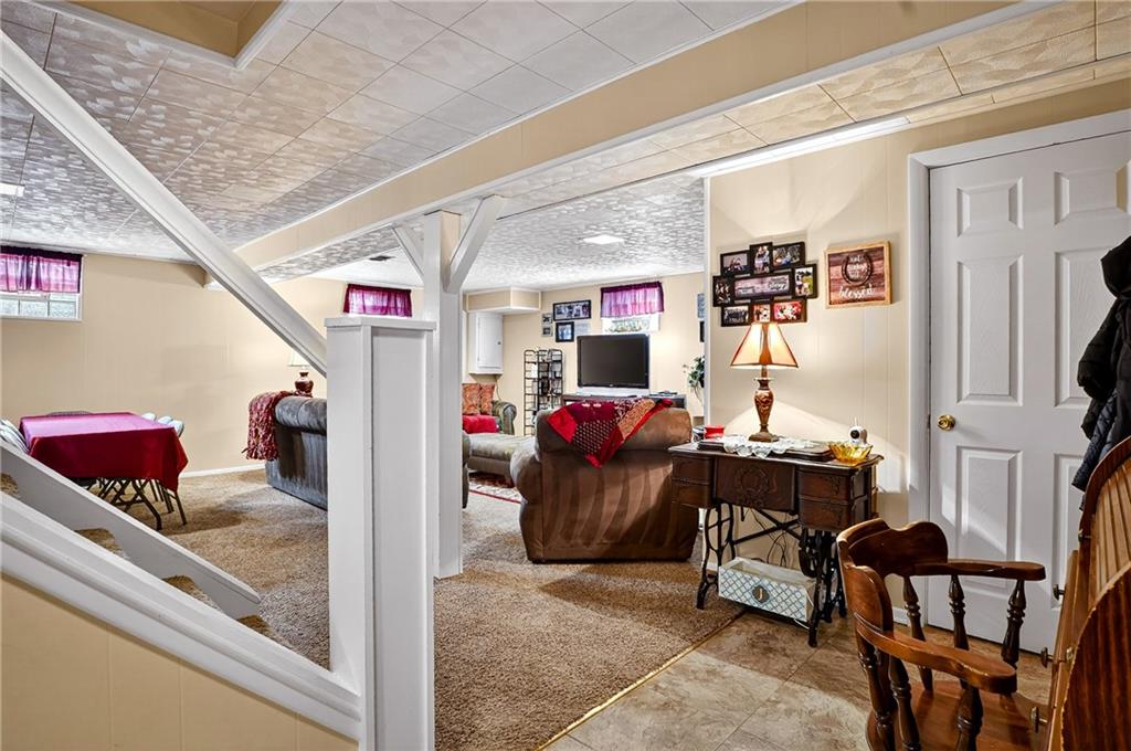 104 Thorncrest Drive McKees Rocks, PA 15136 - Photo 25 of 34 a living room with furniture and a table