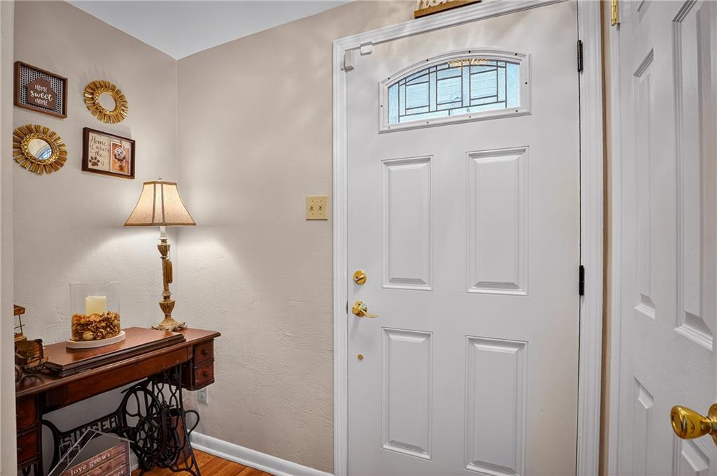 104 Thorncrest Drive McKees Rocks, PA 15136 - Photo 3 of 34 a view of a hallway with workspace