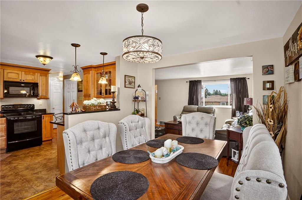 104 Thorncrest Drive McKees Rocks, PA 15136 - Photo 8 of 34 a living room with furniture fireplace and flat screen tv