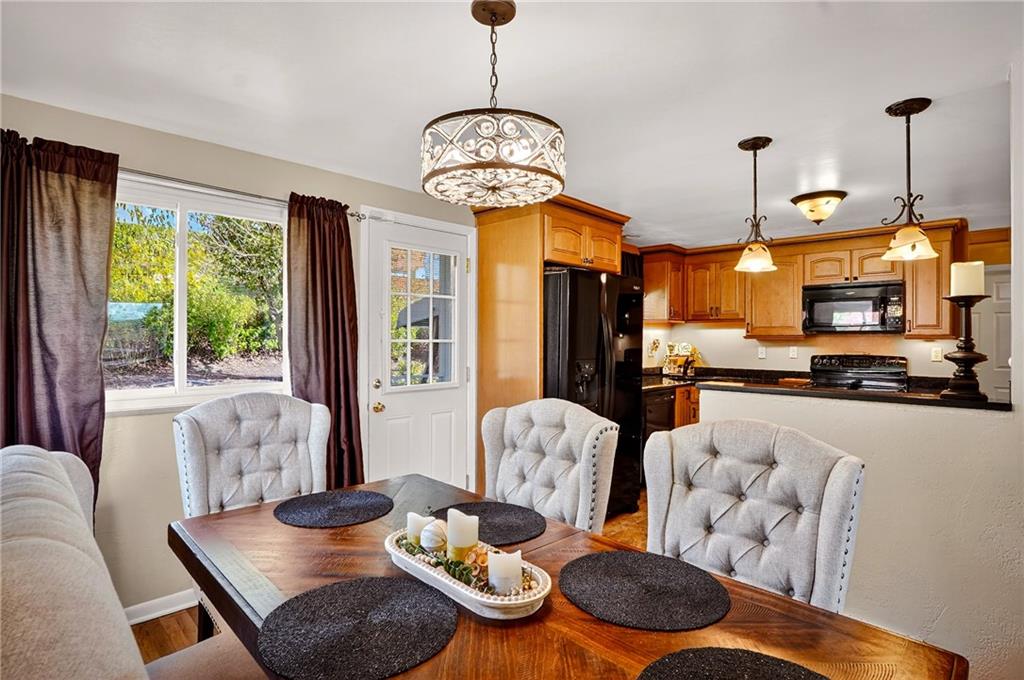 104 Thorncrest Drive McKees Rocks, PA 15136 - Photo 9 of 34 a living room with furniture kitchen view and large windows